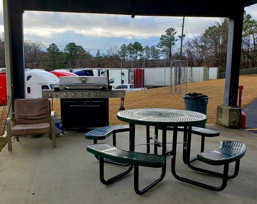 Patio outside in back of main building.