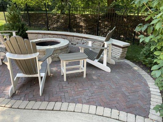 Patio with seat wall and fire pit. Extended from existing patio