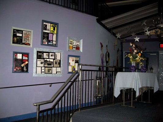 Historic theater performance posters inside the main level of the theater. ~by Jeanie F.