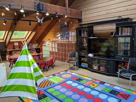 Our Media Center, with vaulted ceilings & skylights, is home to our Schoolagers plus dance parties & well-earned PJmovie parties for all!