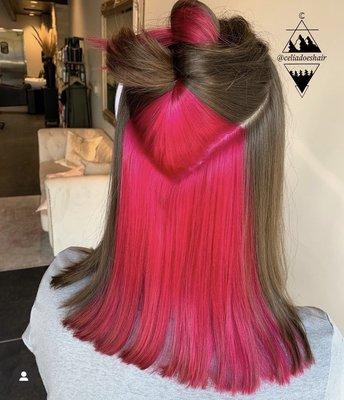 Bright pink on hair that we lightened first. Hair by Celia.