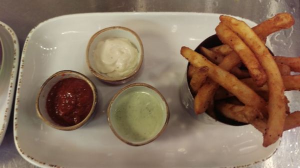 French Fries and Dip trio, spicy ketchup, garlic aioli and green goddess ranch served on the side