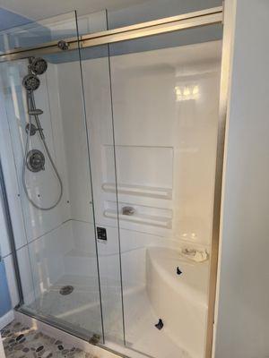 Basement shower stall, fixture, shower doors