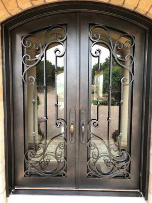 Refinished and fauxed iron door