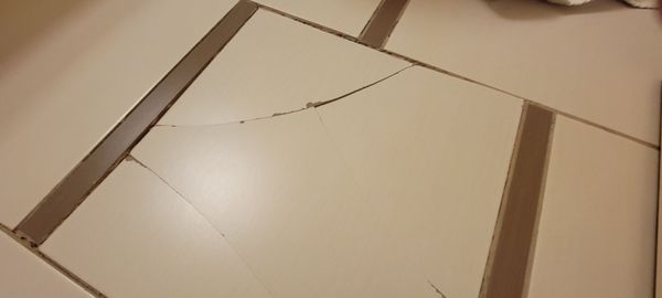 Cracked and loose floor tile