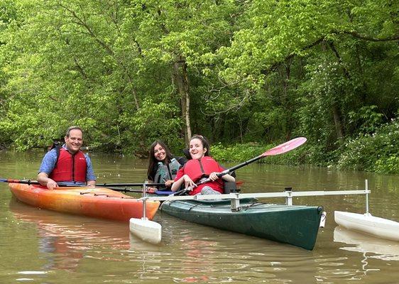 Enjoying kayaking with adaptive kayak setup.