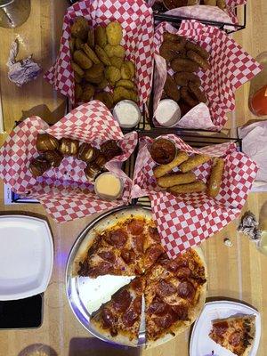 Some pizza and appetizers we were munching on.