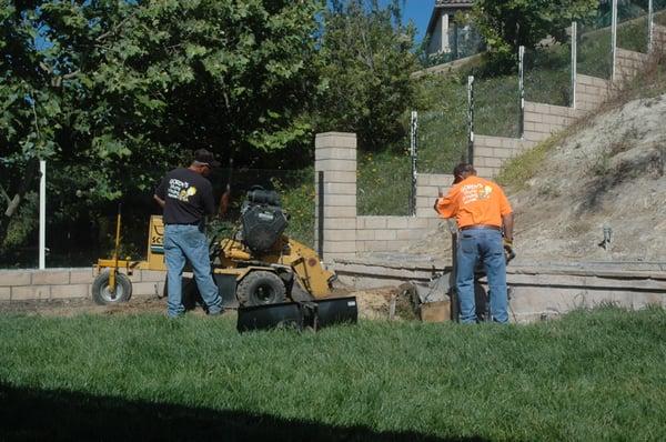 Gordy & Scott working on a stump ("tight spot" machine used to work around plumbing).