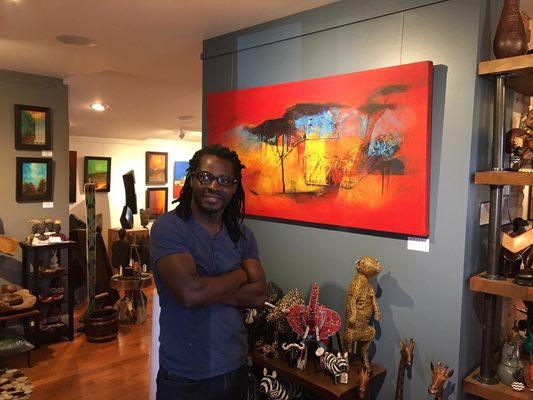 Zim artist David Chinyama with one of his latest works.