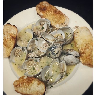 Drunken Clams
 littleneck clams sautéed in a garlic wine sauce with garlic bread