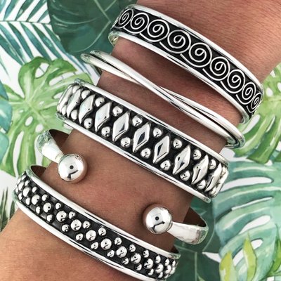 Sterling silver bracelets, hand crafted in Taxco, Mexico.