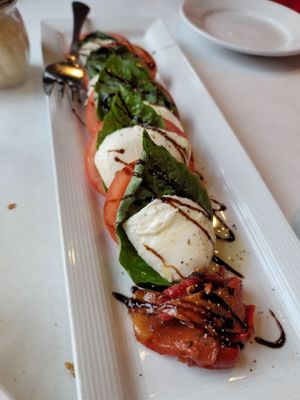 Caprese app. highly recommend also this one has a few red peppers on side with some balsamic on top too.