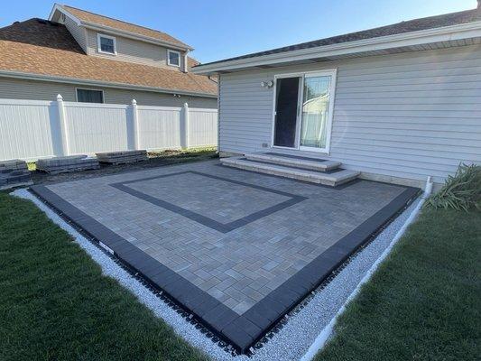 Paver patio finished, before backfill and sod.