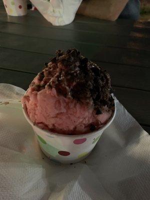 Strawberry sno with chocolate drizzle and chocolate chips.