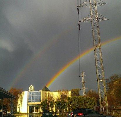 A beautiful double rainbow over our building after a storm.