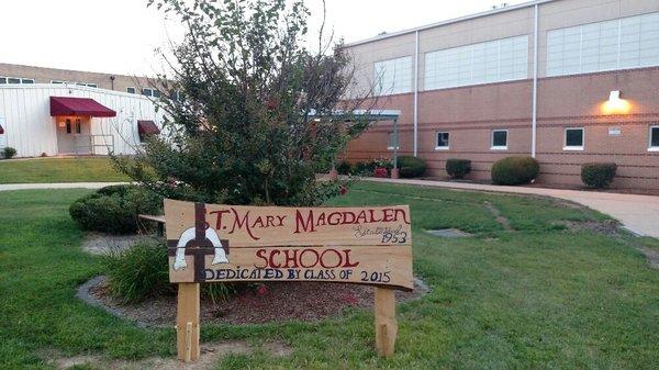 Hand carved and painted school sign