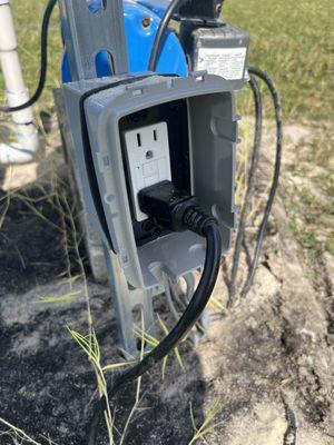 Exterior outlet to the pump. Code violation.