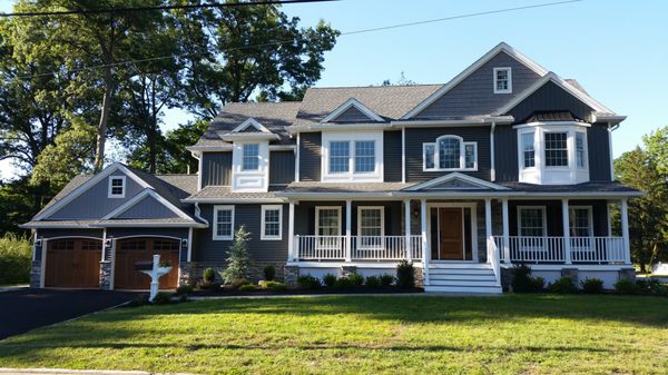 Previously a cape cod and now transformed into a colonial farm house.