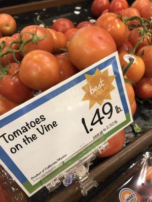 Sad yellowish tomatoes.  I guess it's true though that they do have vines on them.  Certainly they are NOT ripe!