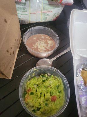 Side of refried beans and guacamole