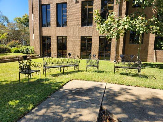 Public seating in front of the library on 2nd St.