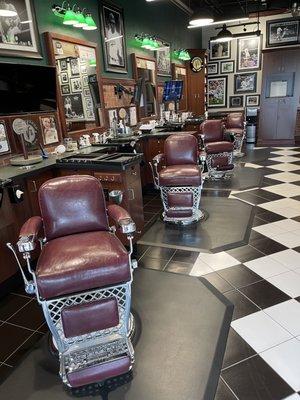 Love the old school barbershop chairs.