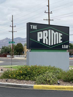 Front sign and mountains in distance