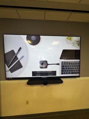 85" Samsung commercial tv with Click-Share & Logitech Rally Bar capability.