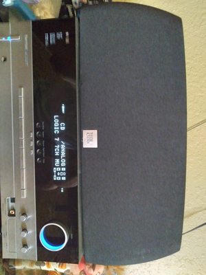 Harmon Kardon receiver with JBL Studio Series center channel speaker.