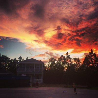 Fire in the sky - sunset over a vacation rental beach cottage in Santa Rosa Beach, Florida.