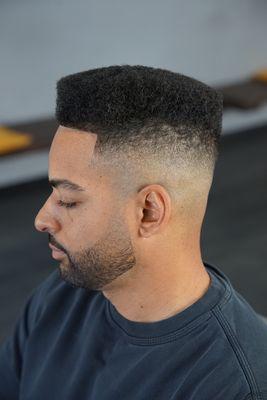 Mid high skin fade