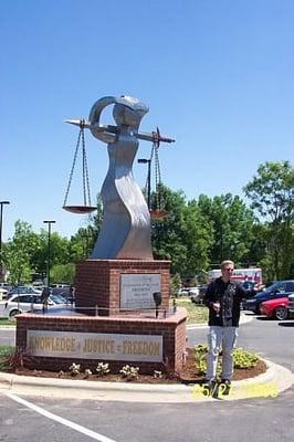 Cliff Homesley speaking at the unveiling of the Arc of Justice sculpture commissioned by Cliff and Fariba Homesley.