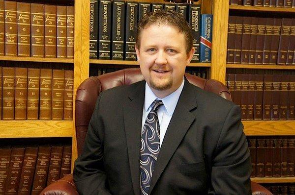 ATTORNEY TRAVIS CHRISTIANSEN