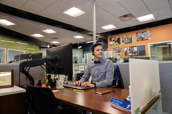 Grant, our Recruiting Coordinator, assisting a job seeker to get connected to one of our Talent Solutions Specialists.