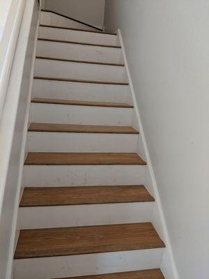 Removed carpet from stairs and install laminate .