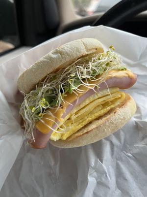 Ham Sunrise Delight on an English muffin +avocado & sprouts $8.10 including tax.