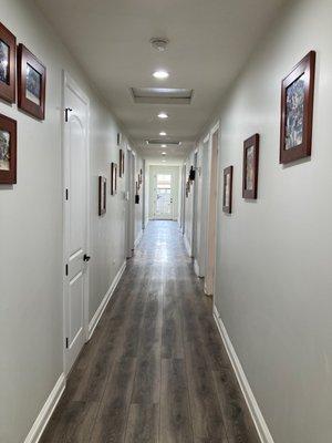 The hallways at our sober living are decorated with photos of alumni that go back to the beginning of New Life House in 1985.