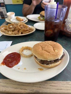 Hamburgers, onion rings and fried cheese