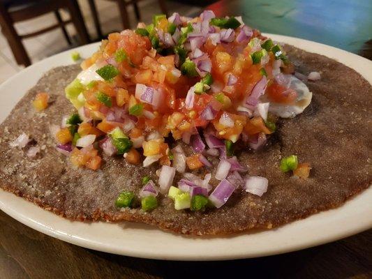 Silpancho- thin breaded steak on top of rice and potatoes