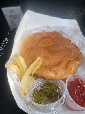 Delicious cheeseburger combo and graciously added some jalapeños on request with a smile