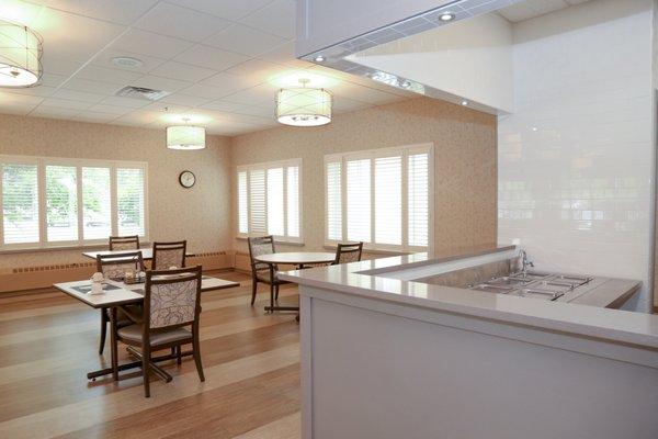 The dining room with a view of the serving area.