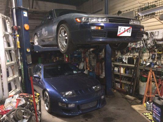 Larry's Silvia Conversion 240SX convertible parked over Ryan's 300ZX.