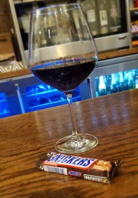 Night cap with the Pezzi King Zinfandel (2018 Dry Creek Valley. Sonoma of course) and a Snickers from Hackettstown NJ. What a combo! ;)