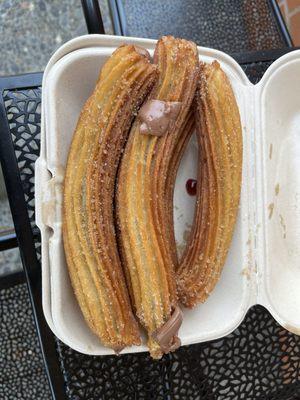 Churros rellenos. Filled with caramel, chocolate or strawberry.