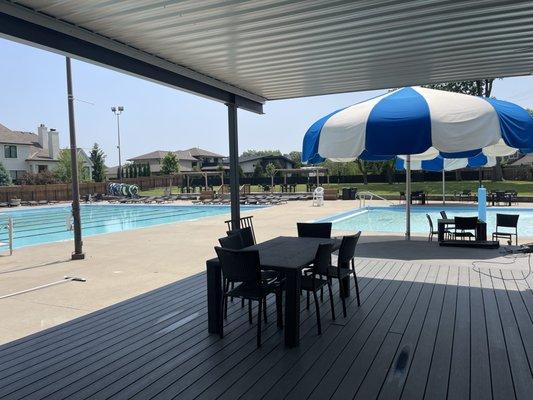 The shaded pool deck is the perfect location for your private event! This space holds just over 100 people.