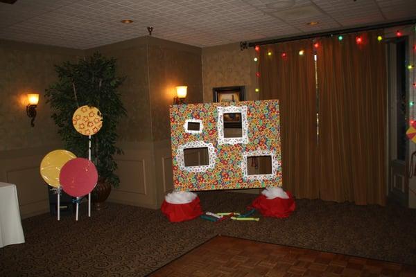 Candy Winter Wonderland. The photo backdrop can be customized with different fabrics and rented out!