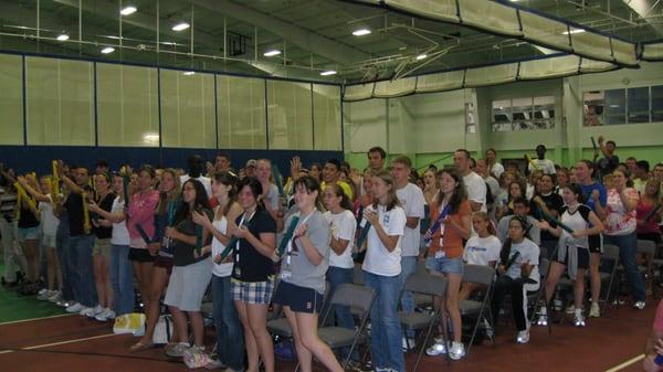 Jim conducting a motivational interactive rhythm programs for 650 students at a college in Massachusetts.