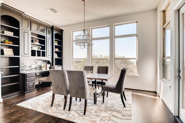 Dining room of a vacant home staged using furniture and accessories from our inventory.