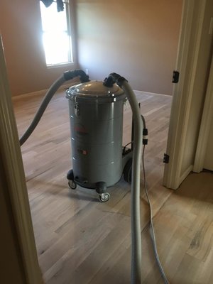 looking to refinishing your hardwoods? We Use State of the Art dust containment systems to protect you and your family!