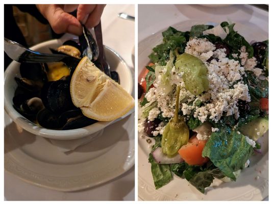 Appetizers. Mussels with garlic butter and a Greek salad.